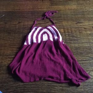 Pink and red shirt show a little bit of back